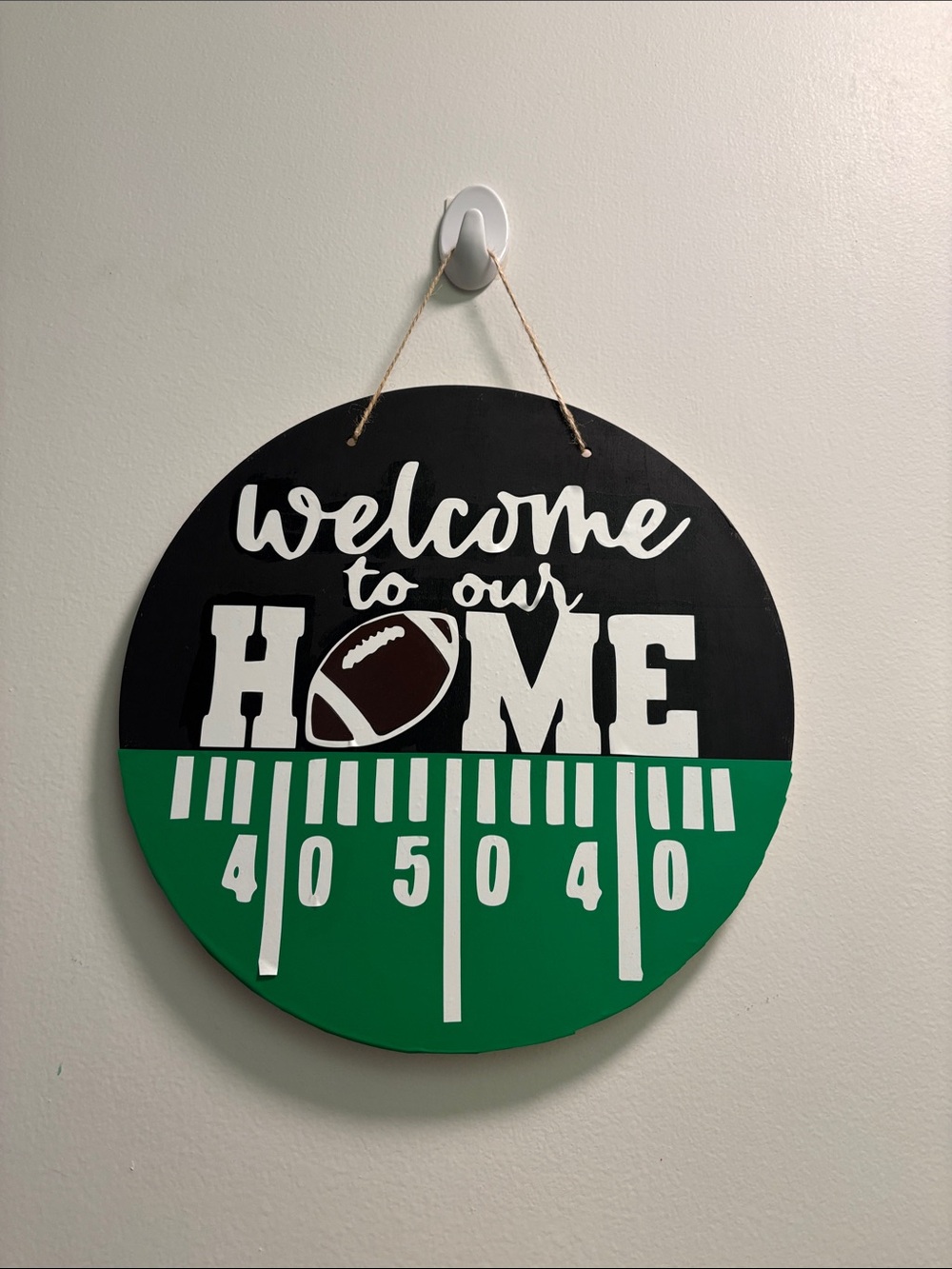 Welcome to Our Home Football Round Wall Sign - Green & Black